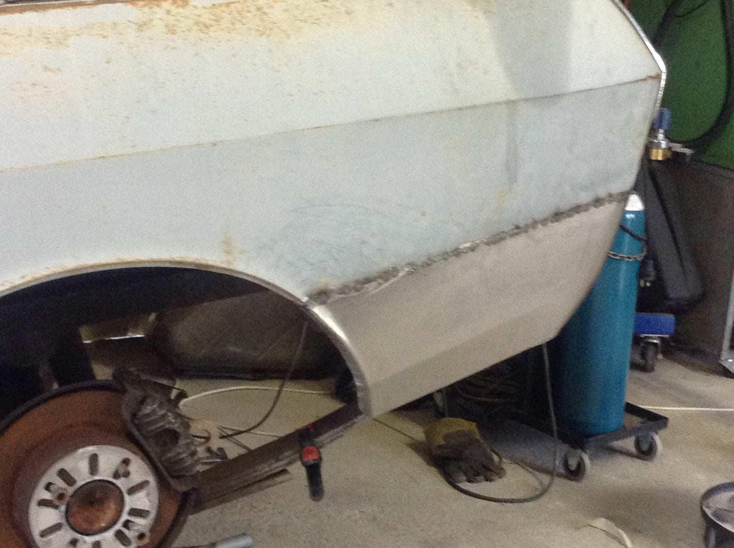 SUITS A DATSUN 1000  WAGON LOWER REAR QUARTER